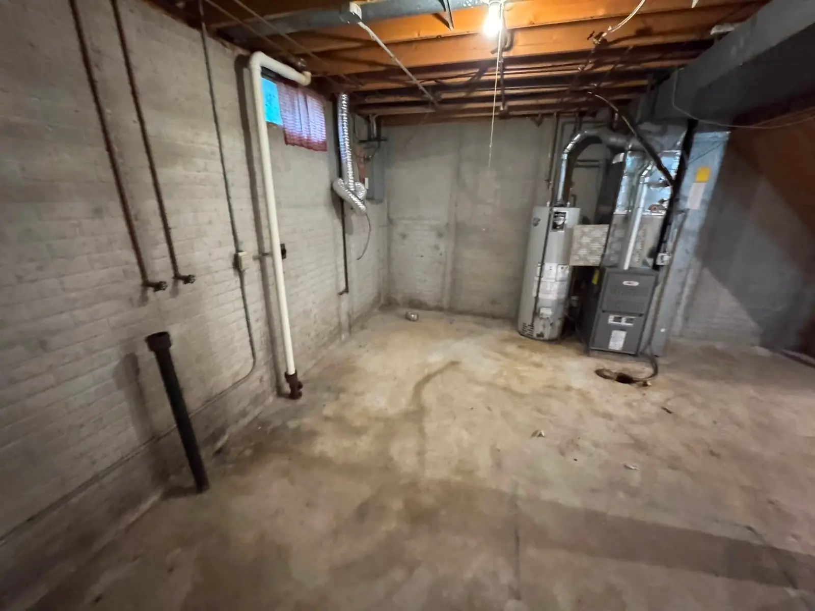 Scarborough basement floor after water extraction, concrete drying out during the restoration process